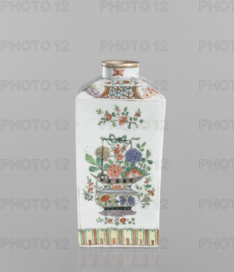Bottle, 18th century, China. Porcelain vessel, height 25.3 cm, width 10.8 cm, depth 10.8 cm. Colored porcelain decorated on each side with a basket of peonies, four flower sprigs, and a trail of lotus petals at the base of the belly; shoulders with butterflies, trellises with flower rosettes and sprigs; neck with four insects. Motifs include peonies, butterflies, floral decorations, and insects., A rectangular porcelain bottle with a short cylindrical neck and a metallic rim sits against a plain gray background; the bottle is white with painted floral and decorative motifs in green, orange, red, blue, yellow, purple, and black, including a central painted basket or vase filled with a cluster of flowers and foliage, smaller flower sprigs above and below that central image, ornamental patterned bands near the top and bottom edges featuring repeating shapes and floral accents, and the neck area decorated with a small flower and a narrow patterned band.
