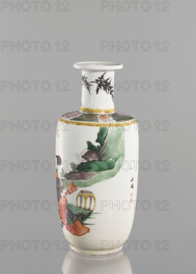 Vase, ; Chinese; Qing dynasty 1644–1911; 19th century; colored porcelain; figurative scenes depicting children and women; narrow neck vase; vessel; height 26.0 cm, diameter 10.5 cm, weight 1.05 kg., A ceramic vase with a narrow neck and flared rim sits against a plain gray background; the vase is predominantly white with painted decorations in green, black, orange, yellow, brown, and pink, showing a scene that includes stylized foliage, a landscape element, and parts of a figure wearing garments in orange and green, with additional decorative bands and motifs near the shoulder and neck and black leafy designs around the upper neck.