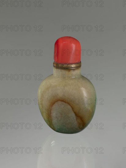 Snuffbox with spoon, Chinese, Qing dynasty 1644–1911, 19th century, moon bottle form, vessel; height 7.5 cm, width 4.5 cm, depth 2.8 cm., A small rounded bottle with a bulbous body showing smooth mottled colors including green, brown, tan, and cream, topped by a metallic band and a red cap; the background is a uniform gray and the bottle casts a faint reflection below.