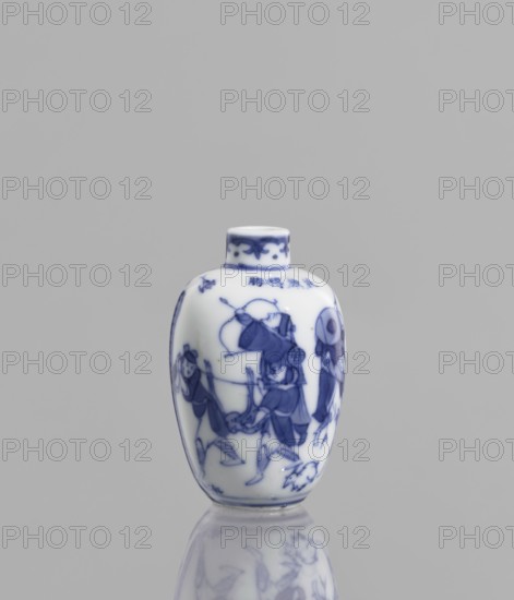 Flask - snuffbox, Chinese, ceramics, blue-and-white porcelain, figurative scenes of hunting with bows, horses, riders, and blowpipes, 18th–19th century, China, vessel; height 6.5 cm, A small white porcelain vessel with blue painted decoration stands upright against a plain gray background, showing a rounded body that tapers toward a short cylindrical neck and a slightly flared rim; the blue painted scene wraps around the body and depicts a group of figures in motion wearing flowing garments and hats, with some holding objects and others walking, and a small animal near the base; additional blue decorative motifs appear near the neck and on the rim.