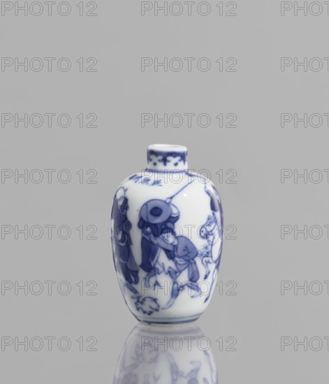 Flask - snuffbox, Chinese, blue-and-white porcelain, figurative scenes of hunting with bows, horses, riders, and blowpipes; ceramic vessel, 18th–19th century, China; height 6.5 cm., A small rounded porcelain bottle with a short neck sits on a reflective surface, decorated in blue on a white background; the blue-painted scene shows a group of figures in traditional dress engaged in activity, with flowing garments and a few animals, and the neck and rim have a decorative blue band.