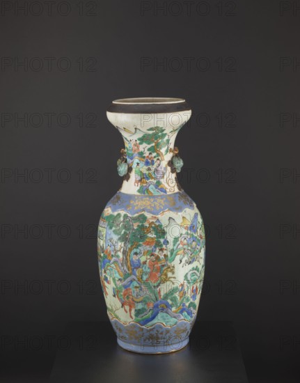 Vase, figurative scenes, Chinese art, Chinese culture, colored porcelain, warriors, plant ornaments, ceramics, decorative vessel, pumpkins, knightly scenes, Qing dynasty 1644–1911, Tongzhi period 1862–1874, foot and arms decorated with applied plastic decorations, 2nd half of the 19th century, China, vessel, height 62.5 cm, diameter 26.5 cm, A tall ceramic vase with a flared neck and rounded body sits against a dark background, decorated with intricate painted scenes and applied elements. The vase displays a palette that includes white, blue, green, turquoise, red, brown, gold, and black. The neck area is primarily white with painted figures and a green tree motif, and it has a dark brown rim and small turquoise-green applied ornamentation on either side. The main body shows a continuous painted landscape with groups of figures, trees, hills, and flowing decorative bands in blue and green, with red and turquoise garments and brown and gold accents. The lower section features a blue ban...
