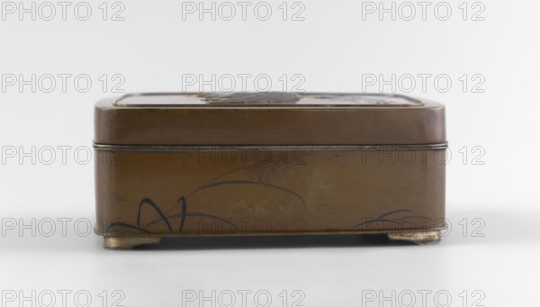Box with lid by Jômi, Eisuke I 1839–1899. Rectangular box with rounded corners, decorated on the flat lid with two flying wild geese in high relief with silver and gold inlay iro-e zogan. Side walls decorated with inclined reeds in silver and shakudo using hira-zogan technique motif level with background, painted effect. Gold signature on the lid in a square field with two stylized kanji resembling archaic characters: Shobi. Ca. 1880–1899 Meiji period, 1868–1912. Kyoto, Japan. Container. Height 4.8 cm; width 10.2 cm; depth 11.4 cm., A rectangular metal box with rounded corners sits on small feet, showing a brown and bronze surface with darker brown and black decorative brushlike motifs along its sides; the lid is slightly inset and the top edge has a thin metallic trim, and the background is a smooth light gray to white gradient.