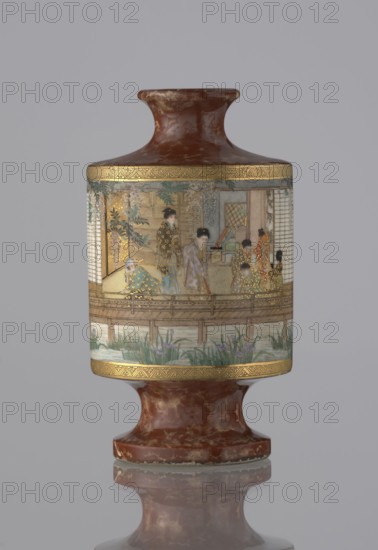 Vase, Kinkôzan, Sôbei VII 1867–1927 maker, Kinkôzan workshop. Genre scenes, Japanese art, ceramics, vases; wisterias, irises, bamboos depicted. Meiji 1868–1912. Vase in the shape of a sake bottle, on a stem; short, narrow neck. 19th/20th century Meiji period, Japan, Kyoto. Vessel; height 11.7 cm, diameter 6.5 cm., An ornate cylindrical vessel with a flared neck and foot in mottled reddish-brown and gold tones, featuring a central painted band depicting a group of people dressed in patterned garments on a wooden veranda beside water and plants; the painted scene includes a few figures in outfits with gold and muted colors, wooden architectural elements, and greenery with green and purple hues, all bordered by decorative gold bands against a neutral gray background.