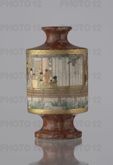 Vase, Kinkôzan Sôbei VII 1867–1927 maker, Kinkôzan workshop; ; genre scenes; Japanese art; ceramics; vases; Japanese; wisterias, irises, bamboos; Meiji 1868–1912; vase in the shape of a sake bottle, on a stem; short, narrow neck; 19th/20th century Meiji period, 1868–1912; Japan, Kyoto; vessel; height 11.7 cm; diameter 6.5 cm, A cylindrical vase with a flared neck and pedestal base, primarily brown with marbled lighter brown and cream patches, decorated around its midsection with a painted scene on a pale background framed by narrow gold bands; the scene shows a group of figures wearing patterned clothing in colors including gold, red, green, black, and pale blue, seated and standing on a wooden veranda above a strip of water with green and purple plants, with architectural elements in beige and pale wood tones and hanging foliage in green and muted purple.