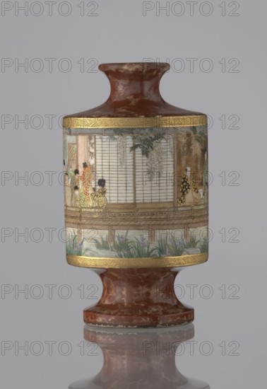 Vase, Kinkôzan Sôbei VII 1867–1927 maker, Kinkôzan workshop co-creator. Genre scenes; Japanese art; ceramics; vases; wisterias, irises, bamboos. Meiji period 1868–1912, 19th/20th century. Vessel: vase in the shape of a sake bottle, on a stem, short narrow neck. Japan, Kyoto. Height 11.7 cm; diameter 6.5 cm., A cylindrical vase with a flared neck and foot sits against a plain light gray background; the vase body has a reddish-brown marbled surface on the neck and foot and a central band decorated with a painted scene featuring a group of figures wearing patterned garments on a wooden veranda, surrounding foliage and hanging vines, and plants growing below the veranda. The decorative band is bordered by narrow gilded bands with geometric patterns. Visible colors include reddish-brown, gold, cream, pale green, muted purple, black, and touches of pink and beige.
