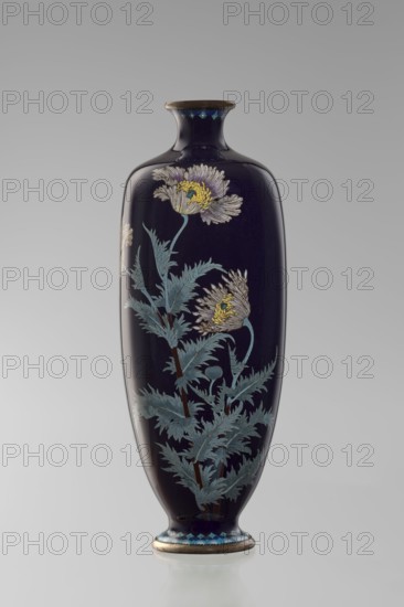 Vase, flowers motif, poppies; Meiji period, ca. 1900; Japan, Nagoya; cloisonné enamel vessel; angular vase one of a pair with rounded edges, on a low round foot and a short neck slightly flaring at the spout. The bottom of the foot and the edge of the spout are framed in silver-plated copper. Against a uniform dark garnet background with a purple hue, a decoratively but faithfully depicted tall flower grows from the base to the neck. Stems with alternating elongated, jagged pale grayish-green leaves support large full corollas of white and light purple flowers with dense yellow stamens and a green pistil; motif executed using the yusen technique, with thin silver wires structuring the leaves and petals. Plant stems are accentuated with chocolate brown enamel. The flowers are presented slightly differently in each vase, enhancing naturalness. Around the foot and the neck is a border of small geometric semicircle and rhombus motifs in white and two shades of blue, also in yusen technique...