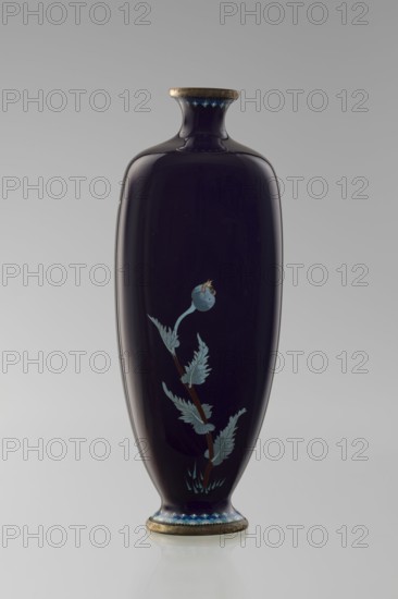 Angular vase one of a pair with rounded edges, on a low round foot and with a short neck slightly flaring at the spout. The bottom of the foot and the edge of the spout are framed in silver-plated copper. Against a uniform dark garnet background with a purple hue, a decoratively but faithfully depicted tall poppy grows from the base to the neck. Stems with alternating, elongated, jagged leaves in pale grayish green support large, full corollas of white and light purple flowers with dense yellow stamens and a green pistil; the motif is executed using the yusen technique, with thin silver wires precisely structuring the delicate, jagged forms of the leaves and petals. The plant stems are accentuated with chocolate brown enamel. The flowers are rendered slightly differently on each vase, enhancing a sense of naturalness. Around the foot and the edge of the neck is a border of small geometric semicircle and rhombus motifs in white and two shades of blue, also made in the yusen technique. c...