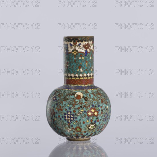 Vase, gift, Japanese art, Japanese, Meiji 1868–1912, geometric decorations, vases, decorative vessels, cloisonné enamel. Vase with a spherical belly and a long cylindrical neck decorated on the entire surface with small floral and geometric motifs on a turquoise background, ca. 1880 Meiji Period, 1868–1912, Japan, Nagoya, vessel; height 9 cm, diameter 5.7 cm., A small rounded vase with a tall cylindrical neck decorated all over in intricate enamel patterns; the body and neck feature a dominant turquoise background with ornamental swirls and floral motifs in red, blue, white, green, and gold, plus areas of dark blue and red bands near the neck and base, and small accents of black and cream, photographed against a pale gray background.