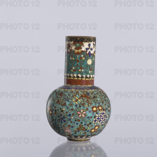 Vase, gift, Japanese art, Japanese, Meiji 1868–1912, geometric decorations, vases, decorative vessels, cloisonné enamel. Vase with a spherical belly and a long cylindrical neck decorated on the entire surface with small floral and geometric motifs on a turquoise background, ca. 1880 Meiji Period, 1868–1912, Japan, Nagoya. Vessel; height 9 cm, diameter 5.7 cm., A small bulbous vase with a tall cylindrical neck, covered all over in intricate cloisonné patterns in turquoise, teal, green, red, blue, white, pink, purple, gold, and black; the neck shows a banded design with scalloped motifs and floral elements while the round body features a dense arrangement of stylized flowers and scrolling vines with highlights of gold; the vase sits on a reflective surface and is set against a pale gray background.