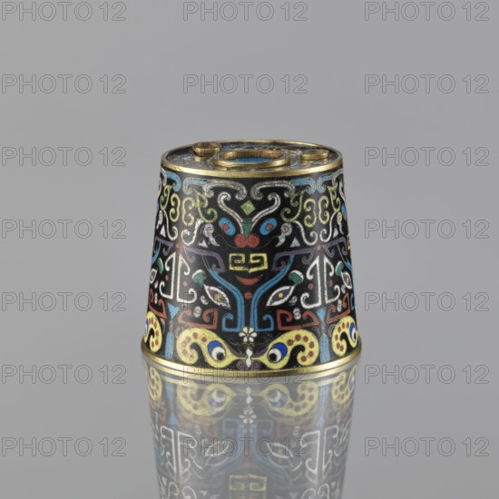Sawdust container, gift; Paderewski, Ignacy Jan 1860-1941 mentioned in provenance; Chinese, Qing dynasty 1644–1911; cloisonné enamel vessel decorated with fantasy beasts and cicadas; base with four inserts; 19th century; height 8.5 cm, diameter 9.7 cm., A small conical object sits upright on a reflective surface, showing a mirrored image below; the object has a glossy black background decorated with intricate swirling patterns in blue, turquoise, red, white, yellow, green, purple, and gold, with metallic gold rims at top and bottom and a circular opening at the top.