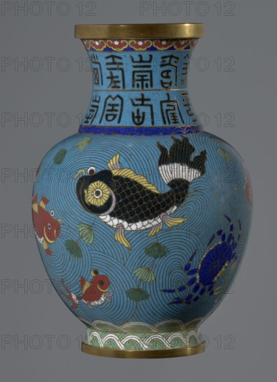 Vase, Qing dynasty 19th century, China. Cloisonné enamel vase on a foot with a neck; height 23.5 cm, diameter 9.3 cm. Decoration: fish and crabs on a turquoise background, archaizing inscription on the neck. Chinese art; vessel., A rounded vase with a flared neck decorated in bright colors on a blue background, featuring a large black fish with gold and white scales and yellow fins, a few smaller red and gold fish, and a blue crab among stylized swirling wave patterns and green leaf-like motifs; the neck has vertical decorative bands and the rim and base are accented in metallic gold with additional red, purple, green, and white ornamental detailing.