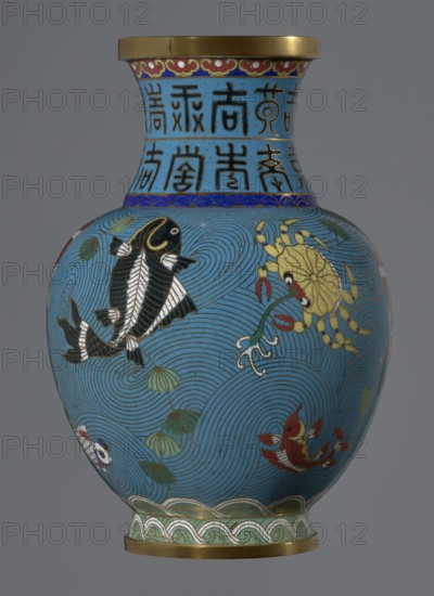 Vase. Cloisonné enamel on metal; 19th century, Qing dynasty, China. Vase on a foot with a neck; height 23.5 cm, diameter 9.3 cm. Decoration: fish and crabs on a turquoise background, with an archaizing inscription on the neck. Chinese art; subject motifs include fish and crabs., A rounded vase with a flared neck and a metallic rim, predominantly turquoise blue with a pattern of concentric wavy lines; a few stylized fish in black, white, and red swim among green leafy plants, and a yellow crab with red-tipped claws appears near the upper body; the neck area shows vertical decorative motifs in darker blue and black against the turquoise, with a narrow band of deep blue and gold near the shoulder; the base features a green and white wave-like border and a metallic foot rim.