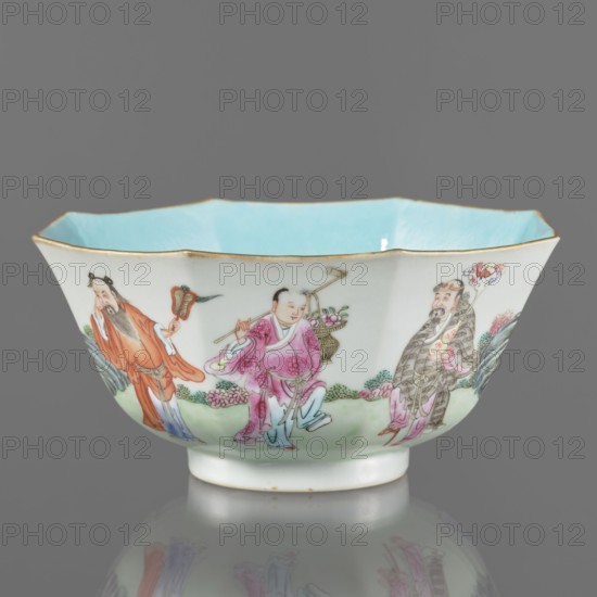 Bowl. Porcelain spherical bowl on a ring foot with turquoise and transparent white glaze; decoration painted with enamel paints and iron red depicting the Eight Immortals. Colored porcelain, Qing dynasty, Jiaqing period 1796–1820, 18th–19th century. China. Height 8.1 cm; diameter 17.6 cm; weight 0.4 kg., ., A scalloped porcelain bowl with a pale blue interior and a thin gold rim, decorated on the exterior with painted figures wearing flowing robes in colors including pink, orange, gray, green, and blue, set against a white ground with small painted foliage and floral motifs in green and pink; the bowl sits on a short white foot and is photographed against a neutral gray background with a subtle reflection beneath it.