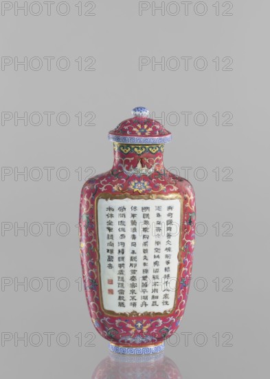 Vase with lid, Chinese, Qing dynasty Qianlong period, 1736–1795. Flattened vase form; colored porcelain with lid; lotus tendril ornament; inscribed poems/poetry. Dimensions: height 22.7 cm, width 10.7 cm, weight 0.65 kg., A slender, lidded vase with a rounded shoulder and narrow neck stands against a plain light gray background; its surface is predominantly deep red with ornate floral and scrolling patterns in colors including yellow, blue, green, white, pink, and gold; the lid and base feature bands with geometric motifs in blue and white, and the lid has a small white knob topped with blue decoration; a recessed rectangular panel on the front shows a white area framed in gold surrounded by the red patterned surface; the overall form is glossy and reflective, and the image shows the vase upright with a faint reflection visible below it.