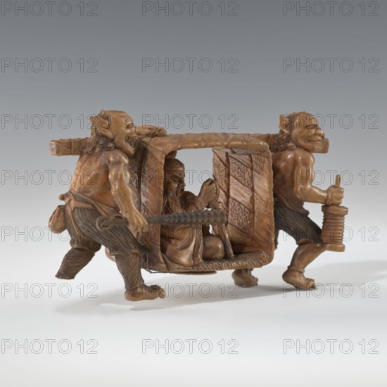 Okimono in the shape of Oni and Shôki, Japanese, Meiji 1868–1912, early 20th century, subject: mythology/demons Shôki, sculpture okimono, materials unspecified, dimensions: height 9.1 cm, width 16.0 cm, The image shows a carved brown wooden sculpture depicting a covered palanquin carried by a group of figures; the palanquin has a textured roof and patterned sides and contains a seated figure with a beard and a rounded hat holding a small object, while two grotesque, muscular carriers with exaggerated facial features, pointed ears, and curly hair walk on either side, one holding a ridged pole and the other gripping a horizontal beam; the figures and palanquin rest on a smooth white-gray surface with a gradient gray background, and the visible colors are shades of brown, gray, and white.