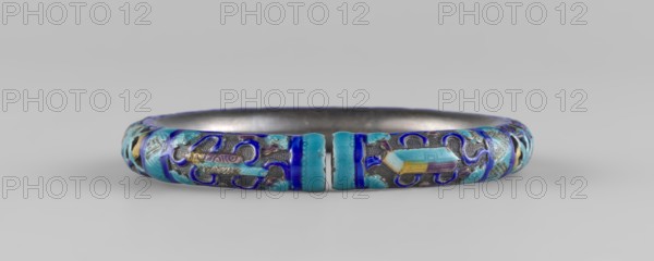 Bracelet;, ; ornament; Chinese art; Chinese culture; women's ornament; Qing dynasty 1644–1911; 19th century; hundred antiquities baigu ornament; jewelry; diameter 11.0 cm., A rounded metal bracelet with an open gap sits centered on a neutral gray background, its outer surface decorated with enamel in shades of blue, turquoise, and purple with small areas of yellow and pale green; the enamel forms raised, flowing motifs and textured patterns against a darker metallic base, and the inner surface appears smooth and metallic gray.