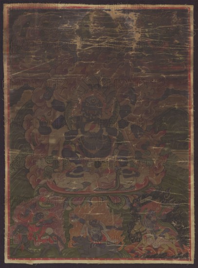 Six-armed Mahakala, Tibetan Buddhist/Mongolian thangka painting. Six-armed Mahakala Tib. mahakala with one face in the shadbhuja type Tib. mgon po phyag drug pa, on a lotus base with six acolytes — five demons around and a lama at the top center. Iconography includes knives, skulls, blood, demons, panthers, elephants, lotus throne, and mantras. 19th century, Mongolia. Scroll thangka; height 39 cm, width 28 cm., A worn painted scene on a dark background shows a central large figure seated on an ornate platform surrounded by swirling cloud- and flame-like motifs and a few smaller figures clustered around the base and sides; the palette includes deep blacks and browns, muted reds and maroons, olive and dark greens, dull gold and beige highlights, and touches of blue and purple. The central figure appears dark in color with decorative headgear and layered garments, and there are several smaller humanlike and animal figures in various poses around the platform, some with flowing hair or gar...