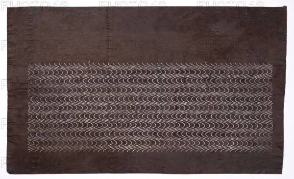 Dyeing stencil katagami with a flowing water motif ryûsui. Ise-katagami stencil, chûban format, stencil. Japanese, Meiji period 19th/20th century, 1868–1912. Dimensions: height 40.6 cm, width 24.4 cm. Materials/technique: dyeing stencil., A dark brown rectangular cloth fills the frame, with a lighter brown border around a central patterned area; the central area contains a repeating wavy pattern made of small white dots forming curved lines across the surface, creating a rhythmic ripple effect; the cloth shows subtle wrinkles and creases and variations in brown tones, with the white dots contrasting against the brown background.