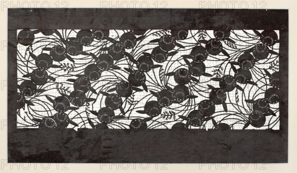Katagami dyeing stencil with pampas grass and rabbit motif susuki ni usagi, Japanese, Meiji period 1868–1912, ise-katagami stencil, chuban format, animals rabbit, grass motif, 19th–20th century, Japan; stencil; height 40.8 cm, width 24.2 cm., A rectangular artwork with a wide dark border surrounding an intricate cut-out panel filled with overlapping circular floral shapes and flowing curved stems and leaves; the cut-out area shows a contrasting light background behind the dark floral silhouettes, creating a repeating pattern of round flower heads with radiating petal details, elongated leaves, and winding tendrils; the colors visible are dark charcoal or black for the border and floral silhouettes, white or off-white for the background behind the cut-out, and a pale beige surrounding margin.
