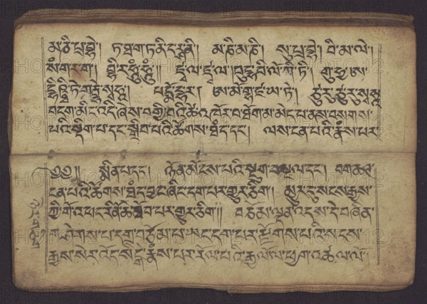 Buddhist Manuscript - Penitential Text Tib. sDig bshags gser gyi zhes bya ba bzhugs+o, unknown author/scribe-copyist, Tibetan Buddhist art, Himalayan culture, Book in Tibetan pecha style, manuscript in student's script. Leaf numbering 2–22 verso, first recto, last two unnumbered. Handwritten notes folio 24 recto and verso. 19th century, Tibet. Manuscript, width 24.0 cm, height 8.1 cm., An open aged paper with a horizontal fold across the middle, showing a group of dark black ink brushstrokes arranged in horizontal lines across both the top and bottom halves; the paper is a yellowed beige with darker brown discoloration near the edges and some small stains, and the inked marks are bold black with occasional faded gray areas; a narrow darker border surrounds the sheet and the paper texture shows creases and worn corners, with a few small spots of darker brown and a slightly darker crease along the center fold.