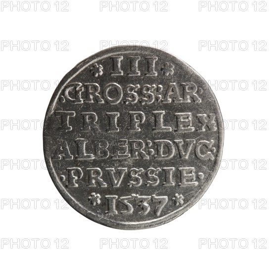 Trojak, Vogelwaider Vogelwaid, Eustachius; publisher Decius, Jost Ludwik fl. 1528–1535 co-creator; mintmaster. Obverse: male bust in armour in profile turned right; short hair, beard with sideburns; rim inscription *ALBERDG MAR BRAN DVX PRVS with continuous border and floral motifs between words. Reverse: continuous border with six-line inscription *III*/.GROSS:AR:/.TRIPLEX./ALBER:DVC./.PRVSSIE./*I537*; dated 1537. Ducal Prussia 1525–1701, Königsberg mint. Coin: diameter 22.1 mm, weight 2.63 g, axis 50°., A round metallic object with a worn silver-gray surface fills the frame against a white background; the object shows raised, blocky shapes arranged in horizontal rows and small decorative marks near the edges, with surface scratches and varied patina giving darker and lighter gray areas across its face.