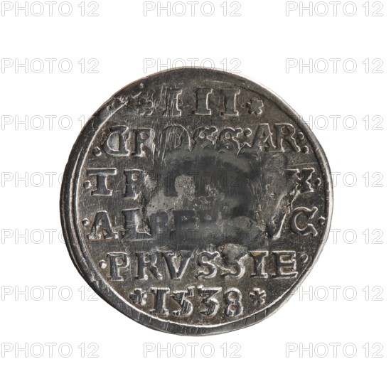 trojak, Vogelwaider Vogelwaid, Eustachius mintmaster/publisher; Decius, Jost Ludwik fl. 1528–1535 co-creator, mint manager. Albrecht Hohenzollern Prince of Prussia; 1490–1568 — iconography: stars, male busts in armour. Obv.: male bust in armour in profile right; short hair, beard with sideburns. Inscription around the rim: *ALBER DG MAR BRAN DVX PRVS. Continuous border, floral motifs between the words. Rev.: in the continuous border an inscription in six lines *III*/.GROSS:AR:/.TR....X./.AL..-.VC./.PRVSSIE./*I538*. Date: 1538. Place: Ducal Prussia 1525–1701, Königsberg mint. Coin; diameter 22.6 mm; weight 2.43 g; axis 120 degrees., A round metallic coin with a worn, reflective surface showing raised lettering and decorative marks around its edge; the coin appears silver-gray with areas of darker tarnish and lighter highlights, and it has a slightly irregular rim and visible scratches and dents across its face.