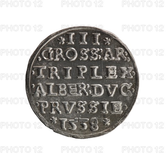 Trojak, Decius, Jost Ludwik fl. 1528–1535 co-creator, Vogelwaider Vogelwaid, Eustachius mint master/publisher. Albrecht Hohenzollern Prince of Prussia; 1490–1568 — iconography: stars, male busts in armour. Obv.: male bust in armour in profile to the right; short hair, beard with sideburns. Inscription around the rim: *ALBER DG MAR BRAN DVX PRVSS*; continuous border with floral motifs between words. Rev.: in the continuous border an inscription in six lines: *III*/.GROSS:AR:/.TRIPLEX./.ALBER:DVC./.PRVSSIE./*1538*. Date: 1538. Place: Ducal Prussia 1525–1701, Königsberg mint. Coin. Diameter 22.0 mm; weight 2.41 g; axis 45°., A round metallic coin shown against a white background, with a textured surface and raised design elements. The coin is predominantly silver-gray with darker gray shadows in recessed areas and some lighter highlights on raised edges. The rim is slightly irregular and the face shows a pattern of raised rectangular blocks and decorative dots arranged in horizontal bands...