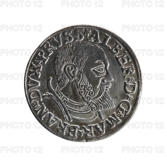 trojak, Vogelwaider Vogelwaid, Eustachius mintmaster/publisher, Decius, Jost Ludwik fl. 1528–1535 co-creator/mint manager. Albrecht Hohenzollern Prince of Prussia; 1490–1568 — iconography: male busts in armour, stars. Obverse: male bust in armour in profile turned to the right; short hair, beard with sideburns. Inscription around the rim: *ALBER DG MAR BRAN DVX PRVSS; continuous border, floral motifs between the words. Reverse: in the continuous border an inscription in six lines: -III*/-.ROSS:A.-/-TRIPLE.-/-ALBER:DVC-/-PRVSSIE-/*I539-. Date: 1539. Place: Ducal Prussia 1525–1701, Königsberg. Object: coin trojak; diameter 21.6 mm, weight 2.63 g, axis 30°., A round metallic coin with a worn silver-gray surface showing a profile of a bearded man facing right, detailed hair and facial features, ornate curved lines suggesting decorative clothing or armor around the neck and shoulder, and a raised border encircling the portrait; the visible colors are silver-gray and darker gray areas from s...