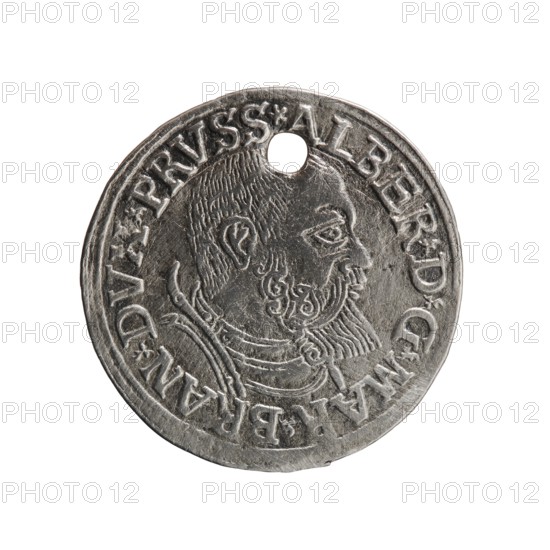 trojak, Vogelwaider Vogelwaid, Eustachius mintmaster / publisher, Decius, Jost Ludwik fl. 1528–1535 mint manager / co-creator. Albrecht Hohenzollern Prince of Prussia; 1490–1568 — iconography: male busts in armour, stars. Obverse: male bust in armour in profile turned to the right; short hair, beard with sideburns. Inscription around the rim: *ALBER DG MAR BRAN DVX PRVSS. Double continuous border, floral motifs between the words. Reverse: in a double continuous border an inscription in six lines: -III-.GROSS:AR:/.TRIPLEX./.ALBER:DVC./.PRVSSIE./-1540-. The denomination and date are between trefoil marks. 1540. Ducal Prussia 1525–1701, Königsberg mint. Coin; diameter 22.7 mm, weight 2.23 g, axis 135°., A round metallic object with a worn surface showing a raised profile of a bearded man facing right, surrounded by a raised rim and a ring of embossed characters; the metal appears silver-gray with darker gray recesses and lighter highlights, and there is a circular hole near the top edge.