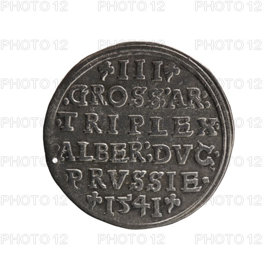 Trojak coin by Maciej Schilling mintmaster and co-creator Jost Ludwik Decjusz fl. 1528–1535; iconography associated with Albrecht Hohenzollern, Prince of Prussia 1490–1568. Obverse: male bust in armour in profile turned to the right; short hair, long beard with sideburns; rim inscription beginning with a trefoil: -ALBER DG MAR BRAN DVX PRVSS-; double continuous border, floral motifs between the words. Reverse: within double continuous border an inscription in six lines: -III-.GROSS:AR:/.TRIPLEX./.ALBER:DVC./.PRVSSIE./-I54I-; denomination and date flanked by trefoil marks. Date: 1541. Place: Ducal Prussia Königsberg. Coin; diameter 23.1 mm; weight 2.48 g; axis 100°., A round, metallic coin with a dark gray surface and lighter silver highlights, showing worn, raised lettering across its face in several horizontal lines and small decorative shapes near the edge; the coin edge is slightly irregular and darker, and the background around the coin is white.