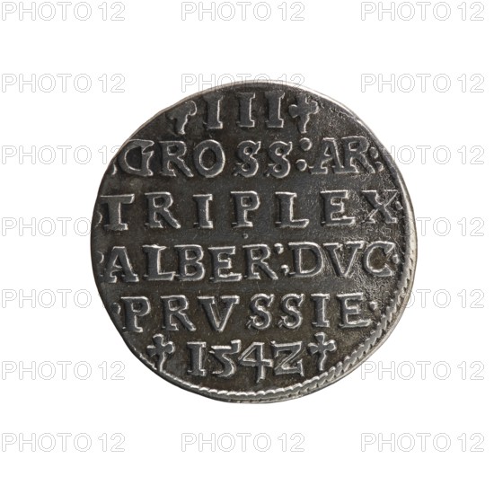 Obverse: male bust in armour in profile turned right; short hair, long beard with sideburns. In the rim an inscription beginning with a trefoil: -ALBER DG MAR BRAN DVX PRVSS pearl border, plant motifs between the words. Reverse: in the pearl border an inscription in six lines: -III-.GROSS:AR:/.TRIPLEX./.ALBER:DVC./.PRVSSIE./-I54Z- the denomination and date are between trefoil marks. Maker/co-creator: trojak, Decius, Jost Ludwik fl. 1528–1535; publisher/mintmaster: Straub Strawb, Heinrich. Date: 1542. Place/type: Ducal Prussia 1525–1701, Königsberg mint. Object: coin; diameter 20.3 mm; weight 2.37 g; axis 150°., A circular metallic object with a worn, uneven surface and raised details, shown against a plain white background. The object has a dark gray to silver coloration with lighter reflective highlights on the raised areas and darker recessed areas. The edge appears slightly irregular and textured. The surface shows rows of raised rectangular and curved shapes and dots arranged in ho...