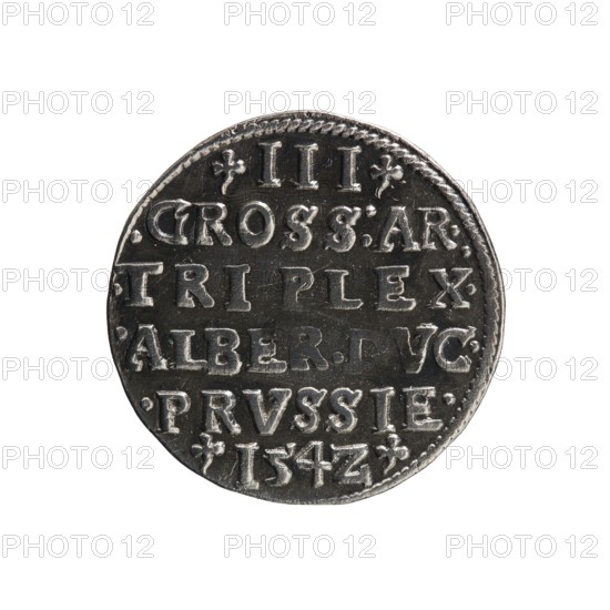 trojak, Straub Strawb, Heinrich mintmaster/publisher, Decius, Jost Ludwik fl. 1528-1535 co-creator; mint manager, Albrecht Hohenzollern Prince of Prussia; 1490-1568 - iconography: trefoils, male busts in armour. Obv.: Male bust in armour in profile to right; short hair, long beard with sideburns. In the rim an inscription beginning with a trefoil -ALBER DG MAR BRAN DVX PRVSS; pearl border, plant motifs between words. Rev.: In the pearl border an inscription in six lines -III-.GROSS:AR:/.TRIPLEX./.ALBER:DVC./.PRVSSIE./-I54Z-. Denomination and date between trefoil marks. 1542. Ducal Prussia 1525–1701, Königsberg mint. Coin; diameter 21.0 mm, weight 2.50 g, axis 110°., A circular metallic object with a dark silver-gray surface and lighter silver raised edges and markings, shown against a white background. The object has a textured rim and several raised decorative elements and shapes distributed across its face. The surface shows worn areas and variations in tone, with darker recesses and...