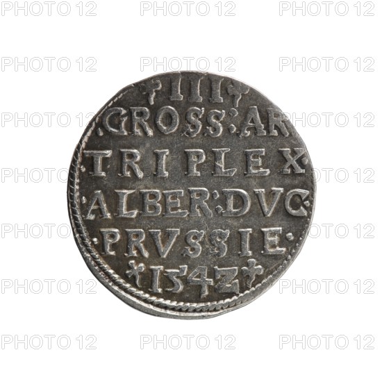 Trojak, Decius, Jost Ludwik fl. 1528–1535 co-creator, Straub Strawb, Heinrich mintmaster/publisher. Albrecht Hohenzollern Prince of Prussia; 1490–1568 — iconography: trefoils, male busts in armour. Obverse: male bust in armour in profile facing right; short hair, long beard with sideburns. In the rim an inscription beginning with a trefoil: -ALBER DG MAR BRAN DVX PRVSS; pearl border, plant motifs between the words. Reverse: in the pearl border an inscription in six lines: -III-.GROSS:AR/.TRIPLEX./.ALBER:DVC./.PRVSSIE./-I54Z- denomination and date between trefoil marks. Date: 1542. Place: Ducal Prussia 1525–1701, Königsberg mint. Object: coin trojak. Diameter: 21.2 mm; weight: 2.61 g; axis: 170°., A round metallic coin with a worn, textured surface showing raised, embossed characters arranged in horizontal lines across its face, set against a white background; the coin displays a scalloped edge with a braided rim and areas of tarnish and patina giving darker gray and lighter silver tone...
