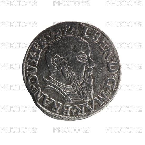 Trojak, Schilling, Maciej mintmaster publisher; Decjusz, Jost Ludwik fl. 1528–1535 co-creator; mint manager. Albrecht Hohenzollern Prince of Prussia; 1490–1568 — iconography: trefoils, male busts in armour. Obverse: male bust in armour in profile turned to the right; short hair, long beard with sideburns. In the rim an inscription beginning with a trefoil: -ALBER DG MAR BRAN DVX PRVS; pearl border, plant motifs between the words. Reverse: in the pearl border an inscription in six lines: -III-/.GROSS:AR:/.TRIPLEX./.ALBER:DVC./.PRVSSIE./-I543-. The denomination and date are between the trefoil marks. 1543. Ducal Prussia 1525–1701, Königsberg mint. Coin; diameter 21.3 mm, weight 2.54 g, axis 180°., A round metallic object with a raised profile of a bearded man facing right, with engraved hair, beard, ear, and clothing details; the surface shows wear and texture variations with some scratches and patina. The object is primarily silver-gray with darker gray recesses and lighter highlights o...