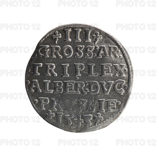 Trojak, Schilling, Maciej mintmaster; Decjusz, Jost Ludwik fl. 1528–1535 co-creator; Albrecht Hohenzollern Prince of Prussia; 1490–1568 — iconography: trefoils, male busts in armour. Obverse: male bust in armour in profile facing right; short hair, long beard with sideburns; rim inscription beginning with a trefoil: -ALBER DG MAR BRAN DVX PRVS; pearl border, plant motifs between words. Reverse: pearl border with six-line inscription: -III-/.GROSS:AR:/.TRIPLEX./.ALBER:DVC./.PRVSSIE./-I543-; denomination and date between trefoil marks. Date: 1543. Place: Ducal Prussia 1525–1701, Königsberg mint. Object: coin trojak/schilling, diameter 21.3 mm, weight 2.54 g, axis 180°., A round metallic object with a worn textured surface, showing raised hammered lettering and decorative marks, predominantly silver-gray with darker gray shadows and some lighter silver highlights, photographed against a plain white background.