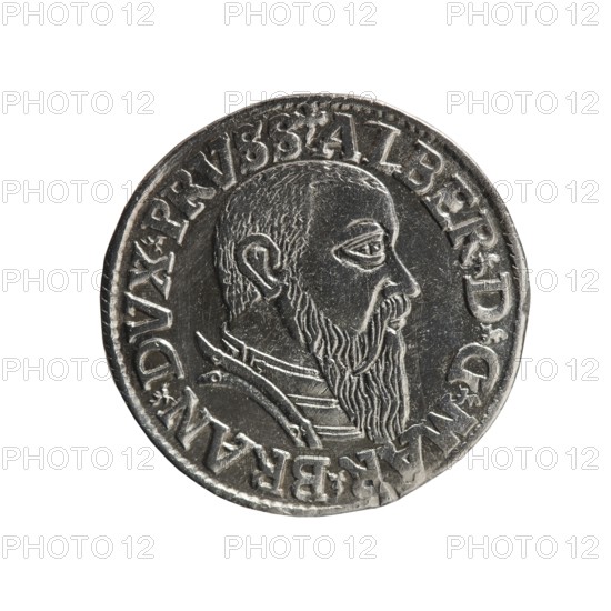 Trojak, Schilling, Maciej mintmaster; Decjusz, Jost Ludwik fl. 1528–1535 co-creator, mint manager. Obverse: male bust in armour in profile turned right; short hair, long beard with sideburns; rim inscription beginning with a trefoil: -ALBER DG MAR BRAN DVX PRVSS. Pearl border, plant motifs between words. Reverse: in the pearl border an inscription in six lines: -III-/.GROSS:AR:/.TRIPLEX./.ALBER:DVC./.PRVSSIE./-I543- 1543. Ducal Prussia, Königsberg. Coin; diameter 21.5 mm; weight 2.61 g; axis 45°., A round metallic object with a raised portrait of a bearded man in profile facing right, showing his head, ear, and long textured beard; the object has a raised rim and raised decorative elements around the portrait, with several repeating raised shapes forming a circular border; the surface shows metallic gray and silver tones with darker recessed areas and lighter highlights; the background around the object is white.