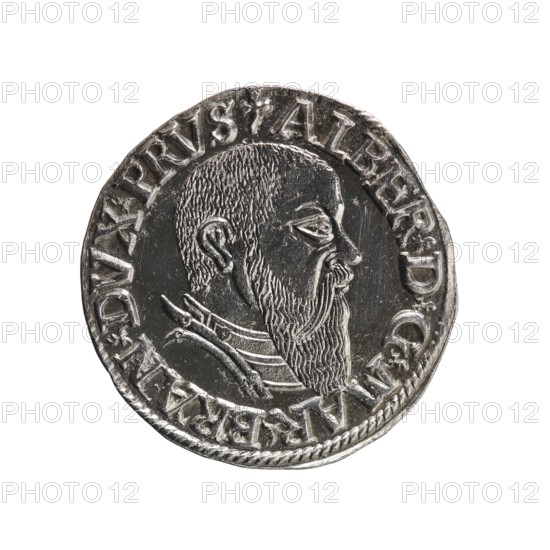 trojak; maker: Schilling, Maciej mintmaster; co-creator: Decjusz, Jost Ludwik fl. 1528–1535, mint manager. Obverse: male bust in armour in profile facing right; short hair, long beard with sideburns; rim inscription beginning with a trefoil: -ALBER DG MAR BRAN DVX PRVS; pearl border; plant motifs between words. Reverse: pearl border with six-line inscription -III-/.GROSS:AR:/.TRIPLEX./.ALBER:DVC./.PRVSSIE./-1543-; denomination and date between trefoil marks. Date: 1543. Place of minting: Königsberg, Ducal Prussia 1525–1701. Medium: coin. Diameter: 21.6 mm. Weight: 2.63 g. Axis: 225°., A metallic round object with a raised profile of a bearded man in side view, showing textured hair and a long detailed beard, a defined ear, eye, nose, and mouth; the figure wears a layered collar or garment with engraved lines. The rim of the object has a decorative raised edge and a band of raised markings encircling the portrait; the surface shows reflective highlights and areas of darker patina. The v...