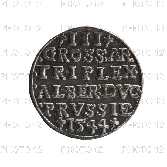 Trojak, Schilling, Maciej mintmaster; Decjusz, Jost Ludwik fl. 1528–1535 co-creator; Albrecht Hohenzollern Prince of Prussia; 1490–1568 — iconography: trefoils, male busts in armour. Obverse: male bust in armour in profile turned to the right; short hair, long pointed beard with sideburns. In the rim an inscription beginning with a trefoil -ALBER DG MAR BRAN DVX PRVSS; pearl border, plant motifs between the words. Reverse: in the pearl border an inscription in six lines -III-/.GROSS:AR:/.TRIPLEX./.ALBER:DVC./.PRVSSIE./-I544-; the denomination and date are between trefoil marks. 1544; Ducal Prussia 1525–1701, Königsberg mint; coin, diameter 21.0 mm, weight 2.65 g, axis 0°., A round metallic object with a dark silver-gray color and a slightly worn surface, shown against a white background. The object has raised, blocky shapes arranged in horizontal bands across its face, creating a textured pattern. The edge of the object is irregular and shows small dents and wear. The overall color pal...