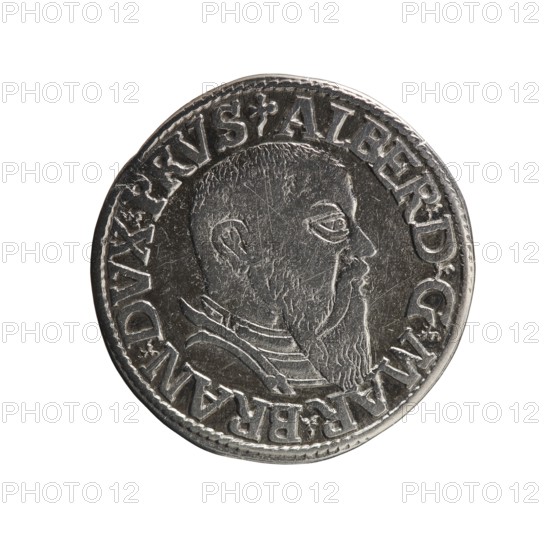 Trojak, Decius, Jost Ludwik fl. 1528–1535 co-creator, Schilling, Maciej publisher. Albrecht Hohenzollern Prince of Prussia; 1490–1568 — iconography: trefoils, male busts in armour. Obverse: male bust in armour in profile turned to the right; short hair, long beard with sideburns. In the rim an inscription beginning with a trefoil: -ALBER DG MAR BRAN DVX PRVS; pearl border, plant motifs between the words. Reverse: in the pearl border an inscription in six lines: -III-/.GROSS:AR:/.TRIPLEX./.ALBER:DVC./.PRVSSIE./-1544- the denomination and date are between trefoil marks. Date: 1544. Place: Ducal Prussia 1525–1701, Königsberg mint. Object: coin trojak; diameter 21.8 mm; weight 2.58 g; axis 225°., A round metallic coin with a worn surface showing a raised profile of a bearded man facing right, surrounded by a raised decorative border and raised lettering around the edge; the coin appears mainly silver and gray with darker gray areas in the recessed parts and lighter silver highlights on the...