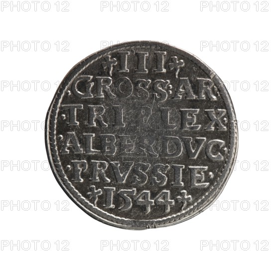 Trojak, Decius, Jost Ludwik fl. 1528–1535 co-creator, Schilling, Maciej publisher. Albrecht Hohenzollern Prince of Prussia; 1490–1568 — iconography: trefoils, male busts in armour. Obverse: male bust in armour in profile turned to the right; short hair, long beard with sideburns. In the rim an inscription beginning with a trefoil: -ALBER DG MAR BRAN DVX PRVS; pearl border; plant motifs between the words. Reverse: in the pearl border an inscription in six lines: -III-/.GROSS:AR:/.TRIPLEX./.ALBER:DVC./.PRVSSIE./-I544-; the denomination and date are between the trefoil marks. 1544. Ducal Prussia 1525–1701, Königsberg mint. Coin; diameter 21.8 mm; weight 2.58 g; axis 225°., A circular metallic object with a worn, textured surface displayed against a white background; the object is mostly gray and silver with darker gray areas from wear and shadow, showing raised and recessed detailing across its face; the edge has a patterned border and irregularities, and the surface has scratches and sma...