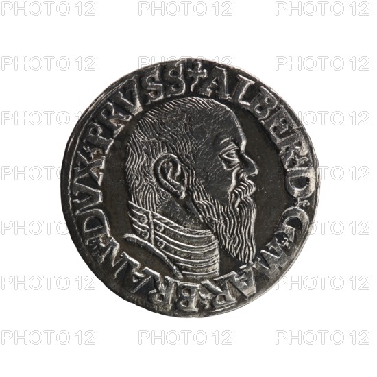 Trojak, Schilling, Maciej mintmaster; Decjusz, Jost Ludwik fl. 1528–1535 co-creator, mint manager. Obverse: male bust in armour in profile facing right; short hair, long pointed beard with sideburns; rim inscription beginning with a trefoil: -ALBER DG MAR BRAN DVX PRVSS; pearl border, plant motifs between words. Reverse: inscription in six lines within a pearl border: -III-/.GROSS:AR:/.TRIPLEX./.ALBER:DVC./.PRVSSIE./-1544-; denomination and date between trefoil marks. 1544. Ducal Prussia 1525–1701, Königsberg mint. Coin; diameter 21.0 mm; weight 2.61 g; axis 290°., A circular metallic object with a raised profile of a bearded man facing right, showing detailed hair texture and a lined collar; the object has a raised rim with decorative raised elements along the edge. Visible colors include silver, dark gray, and black.