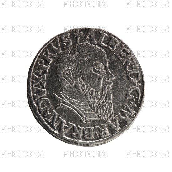 trojak, Decius, Jost Ludwik fl. 1528-1535 co-creator, Schilling, Maciej mintmaster / publisher, Albrecht Hohenzollern Prince of Prussia; 1490-1568 - iconography: trefoils, male busts in armour. Obv.: male bust in armour in profile right; short hair, long beard with sideburns. In the rim an inscription beginning with a trefoil -ALBER DG MAR BRAN DVX PRVSS; pearl border, plant motifs between the words. Rev.: in the pearl border an inscription in six lines -III-/.GROSS:AR:/.TRIPLEX./.ALBER:DVC./.PRVSSIE./-I544-; the denomination and date are between the trefoil marks. 1544. Ducal Prussia 1525–1701, Königsberg mint. Coin; diameter 21.0 mm, weight 2.50 g, axis 90°., A round metallic coin with a worn silver-gray surface showing a raised profile of a bearded man facing right; the portrait displays textured hair and a long beard with etched lines, and the shoulder area shows part of clothing with layered collars. Around the edge of the coin is a raised rim with a continuous decorative band fea...