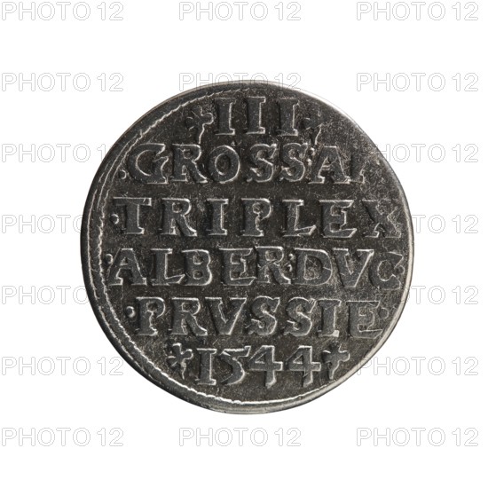 trojak, Schilling, Maciej mintmaster; Decjusz, Jost Ludwik fl. 1528-1535 co-creator; mint manager. Albrecht Hohenzollern Prince of Prussia; 1490-1568 — iconography: trefoils, male busts in armour. Obv.: male bust in armour in profile turned to the right; short hair, long beard with sideburns. In the rim an inscription beginning with a trefoil: -ALBER DG MAR BRAN DVX PRVS; pearl border, plant motifs between the words. Rev.: in the pearl border an inscription in six lines: -III-/.GROSS:AR./.TRIPLEX./.ALBER:DVC./.PRVSSIE./-I544-. The denomination and date are between trefoil marks. 1544, Königsberg; Ducal Prussia 1525–1701. Coin; diameter 21.2 mm, weight 2.46 g, axis 180°., A circular metal coin with a worn, textured surface showing raised, blocky characters arranged in horizontal lines across its face; the coin's surface is primarily shades of gray and silver with darker gray recesses and lighter silver highlights along the raised edges, and a thin raised rim around the edge; the metal a...