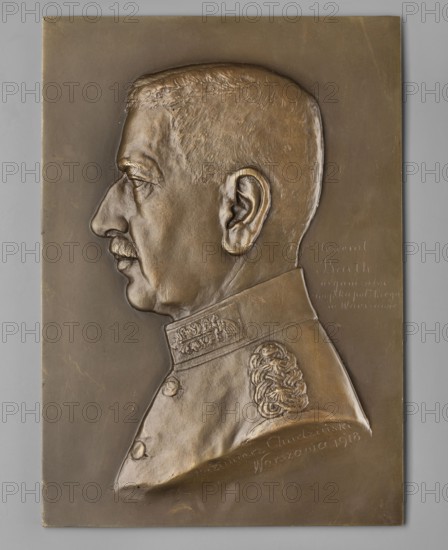 Felix von Barth — organizer of the Polish army in Warsaw; Chodzinski, Kazimierz Mieczyslaw 1861–1921 medalist/author; Chodzinski, Kazimierz 1861–1919; generals; male busts; von Barth, Felix 1851–1931 — iconography. Obverse: male bust in left profile, short-cropped hair, mustache, in uniform; on the right side an engraved inscription in five lines. 1918, Warsaw, Poland. Plaque. Dimensions: 230 mm; 143 mm., A bronze relief plaque showing the left profile of a man’s head and upper torso mounted on a rectangular backing, with the man wearing a high-collared uniform featuring decorative embroidery on the collar and shoulder; the relief displays textured hair, a prominent ear, a mustache, and detailed facial features with visible contours and shadows. The plaque and relief are predominantly bronze in color with variations of darker and lighter bronze tones and subtle greenish-gray patina along some edges, set against a neutral light gray background.