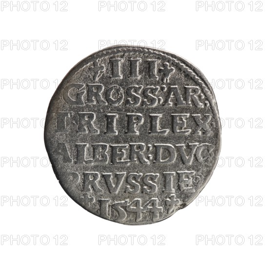 trojak, Schilling, Maciej mintmaster; Decjusz, Jost Ludwik fl. 1528-1535 mint manager co-creator; trefoils; Albrecht Hohenzollern Prince of Prussia; 1490-1568 - iconography; male busts in armour. Obv.: Male bust in armour in profile turned to the right; short hair, long beard with sideburns. In the rim an inscription beginning with a trefoil: -ALBER DG MAR BRAN DVX PRVS; pearl border; plant motifs between the words. Rv.: In the pearl border an inscription in six lines: -III-/GROSS:AR:/.TRIPLEX./ALBER:DVC./.PRVSSIE./-I544-; the denomination and date are between the trefoil marks. 1544. Ducal Prussia 1525–1701; Königsberg mint. Coin: diameter 20.9 mm, weight 2.32 g, axis 180°., A single round metallic object with a worn, textured surface centered on a white background. The object appears silvery-gray with darker gray shadows in recessed areas and lighter highlights on raised edges. The surface shows a pattern of raised shapes and incised lines forming rows and separated by narrow bands, ...
