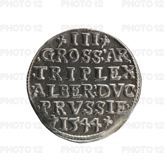 Trojak coin by Schilling, Maciej mintmaster and co-creator Decjusz, Jost Ludwik fl. 1528–1535 mint manager. Obverse: male bust in armour in profile turned right; short hair, long beard with sideburns; rim inscription beginning with a trefoil: -ALBER DG MAR BRAN DVX PRVSS; pearl border; plant motifs between words. Reverse: inscription in six lines within pearl border: -III-/.GROSS:AR:/.TRIPLEX./.ALBER:DVC./.PRVSSIE./-I544-; denomination and date between trefoil marks. Date: 1544. Place: Ducal Prussia 1525–1701, Königsberg mint. Coin; diameter 21.1 mm; weight 2.52 g; axis 270°., A round metallic disc with a slightly irregular edge showing embossed raised details across its surface; the metal appears silver-gray with areas of darker gray patina and lighter reflective highlights; the surface shows rows of raised rectangular and curved shapes forming patterned elements; small decorative motifs appear near the top and bottom edges; the background around the disc is plain white.