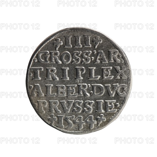 Trojak; Schilling, Maciej mintmaster; Decjusz, Jost Ludwik fl. 1528–1535 co-creator. Obverse: male bust in armour in profile turned right; short hair, long pointed beard with sideburns. Rim inscription beginning with a trefoil: -ALBER DG MAR BRAN DVX PRVSS. Pearl border; plant motifs between words. Reverse: inscription in six lines within pearl border: -III-/.GROSS:AR:/.TRIPLEX./.ALBER:DVC./.PRVSSIE./-I544-. Denomination and date between trefoil marks. Date: 1544. Place: Ducal Prussia, Königsberg. Iconography: Albrecht Hohenzollern Prince of Prussia; 1490–1568 — trefoils, male busts in armour. Coin; diameter 21.0 mm; weight 2.48 g; axis 340°., A round metal coin with a worn, textured surface shown against a white background; the coin appears silver-gray with darker gray shadows in recessed areas and lighter silvery highlights on raised portions; the face of the coin shows a group of raised, blocky characters arranged in horizontal lines and separated by shallow grooves, with small deco...