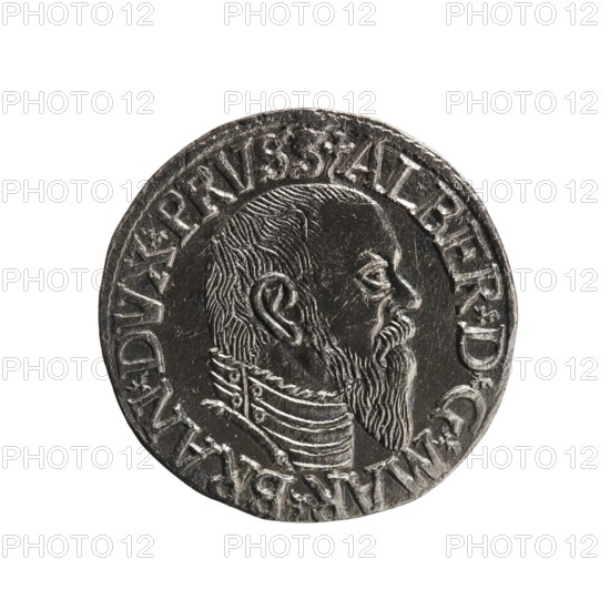 Trojak coin by Schilling, Maciej mintmaster and co-creator Decjusz, Jost Ludwik fl. 1528–1535 mint manager. Obverse: male bust in armour in profile to the right; short hair, long pointed beard with sideburns; rim inscription beginning with a trefoil: -ALBER DG MAR BRAN DVX PRVSS; pearl border; plant motifs between words. Reverse: pearl border with six-line inscription: -III-/.GROSS:AR:/.TRIPLEX./.ALBER:DVC./.PRVSSIE./-I544-; denomination and date between trefoil marks. Dated 1544. Ducal Prussia 1525–1701, Königsberg mint. Coin: diameter 21.2 mm, weight 2.51 g, axis 320°., A round metallic coin with a dark silver-gray surface featuring a raised profile of a bearded man facing right, showing textured hair, a pronounced ear, detailed facial features, and a layered ornamental collar; the coin rim is raised and bears a continuous band of raised markings; visible colors include silver-gray, dark gray, and highlights of lighter silver.