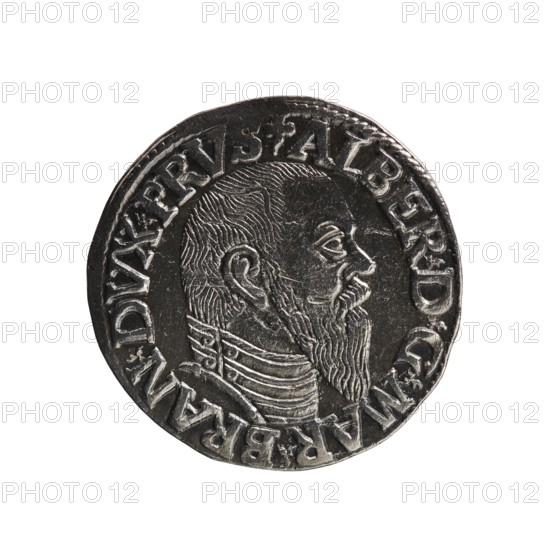 trojak; maker: Schilling, Maciej mintmaster; co-creator: Decjusz, Jost Ludwik fl. 1528–1535, mint manager. Albrecht Hohenzollern Prince of Prussia; 1490–1568 — iconography: trefoils, male busts in armour. Obverse: male bust in armour in profile facing right; short hair, long pointed beard with sideburns; rim inscription beginning with a trefoil: -ALBER DG MAR BRAN DVX PRVS; pearl border, plant motifs between words. Reverse: pearl border with six-line inscription: -III-/.GROSS:AR:/.TRIPLEX./.ALBER:DVC./.PRVSSIE./-I544-; denomination and date between trefoil marks. Date: 1544. Place: Ducal Prussia 1525–1701, Königsberg mint. Object: coin trojak. Diameter 21.1 mm; weight 2.62 g; axis 290°., A round metallic coin with a raised profile of a bearded man facing right, showing detailed hair, ear, eye, nose, mustache, and a long beard. The man appears to wear layered clothing at the neck with decorative lines. The coin surface is textured with engraved ridges and worn areas. The edge of the coi...